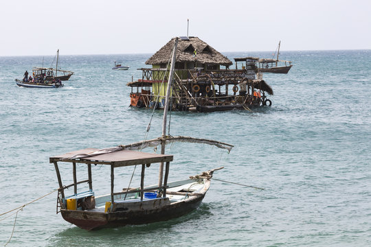 Boats in the Indian Ocean in the Zanzibar archipelago. Formerly