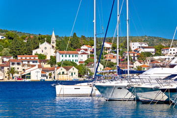 Rogoznica sailboats in harbor and waterfront architecture