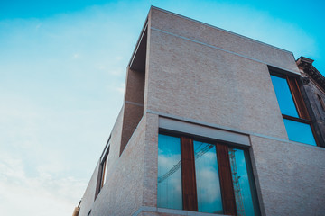 Modern Low Rise Apartment Building with Blue Sky