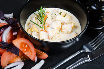 Chicken baked in sauce.