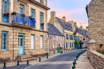 Stone houses on a street in Roscoff, Brittany, France