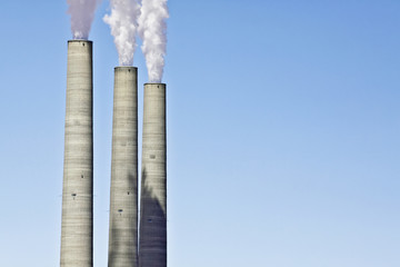 exhaust stacks from a coal burning power plant