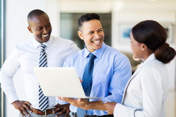 group of business people using laptop