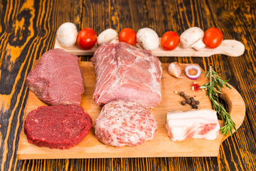 Neatly arranged pieces of meat on cutting board