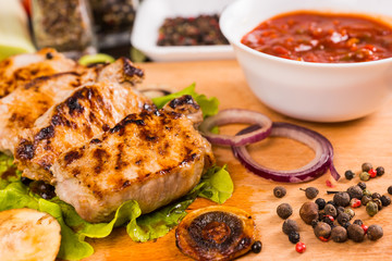 Grilled Pork with Bowl of Salsa and Vegetables