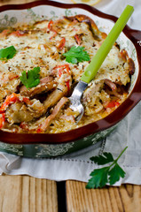 Carp baked with sour cream, pepper, bacon and onions