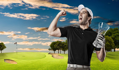Golf Player using a black uniform.