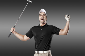 Golf Player using a black uniform.