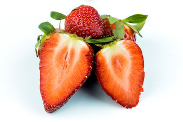 Half of strawberry isolated on white background