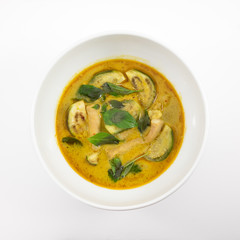 The delicious homemade Thai green curry with pork (Gang Keaw Wan) in white bowl.