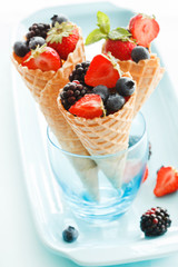 fresh berries in waffle cone