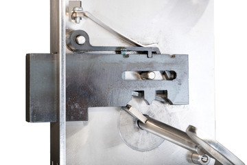 View of the inside mechanism of a basic sample door lock in the locked position. Sample with inserted key.