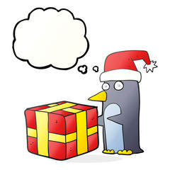 thought bubble cartoon christmas penguin with present
