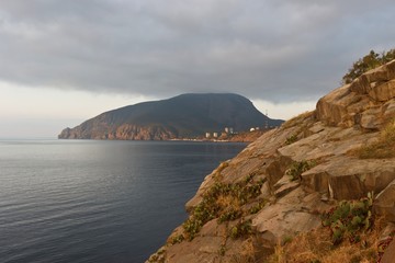 Mountain on seacoast at sunrise