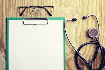 stethoscope background notepad pen
