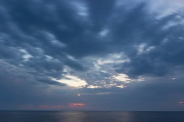 Naklejka premium Beautiful sunrise with dramatic sky over Black sea, Crimea