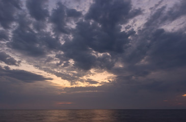 Beautiful sunrise with dramatic sky over Black sea, Crimea