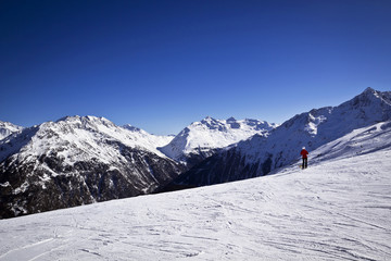 Woman enjoying skiing in alps