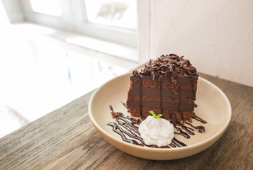 Chocolate cake with chocolate buttercream frosting and ganache a