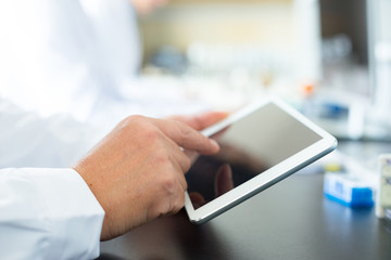 people doing chemical experiment in modern lab