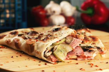 Calzone pizza rolls with ham and mushrooms