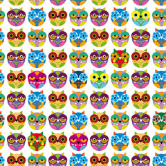 Seamless pattern with bright colored owls. Vector