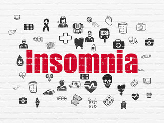 Medicine concept: Insomnia on wall background