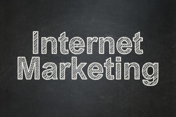 Marketing concept: Internet Marketing on chalkboard background