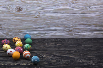 Easter eggs on wooden background.