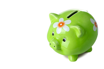 cute green piggy Bank with painted flower on a white isolated background