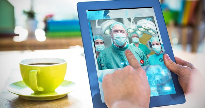 Composite image of smiling surgeon posing with a team