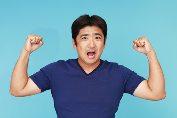 Fototapeta premium ガッツポーズの男性