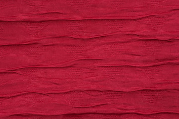 Red fabric background wave like macro