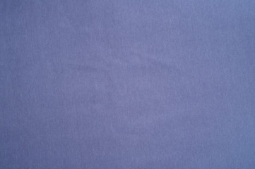 Dark lilac fabric background close up