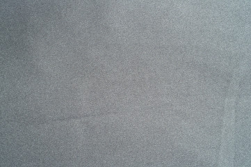 Grey fabric background close up