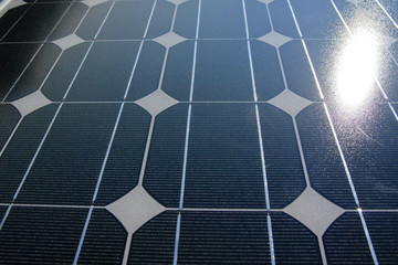 detail photo of a solar cell with sun erflection
