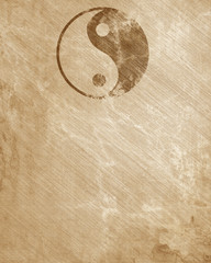 Grunge yin yang symbol background.