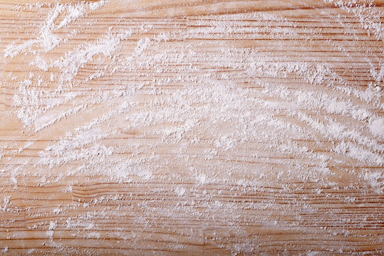 Background with flour and pastry board