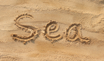 Sea - sand writing on the beach
