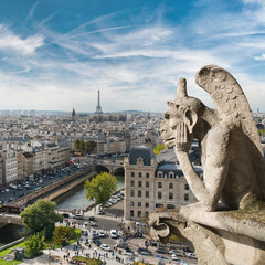 Gargoyle and city view from the roof of Notre Dame de Paris - 104265767
