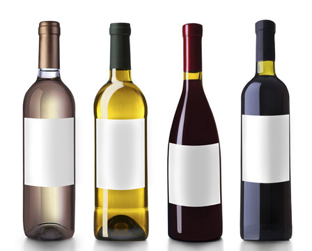 Bottles of wine with empty labels, isolated on white