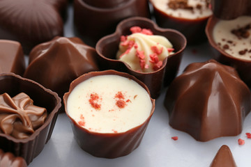 Assorted chocolate candies, close up