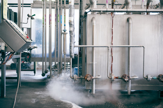 Steam from tubes in a beer factory