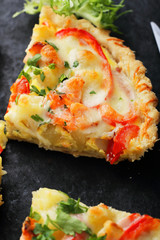 slice of quiche with salmon