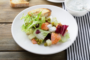salad with baked fish