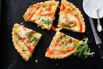 quiche with slice salmon and paprika