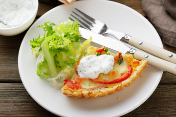 slice of salmon and vegetables quiche