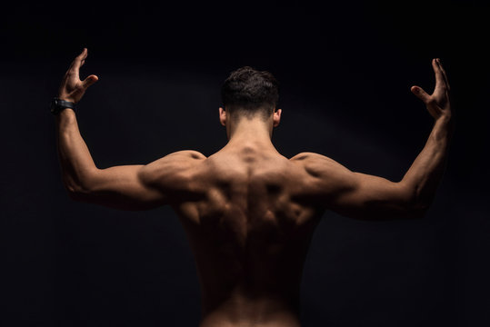 Showing his fit body