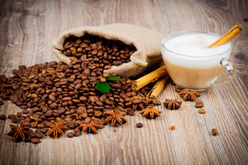 Cup of coffee on wooden background