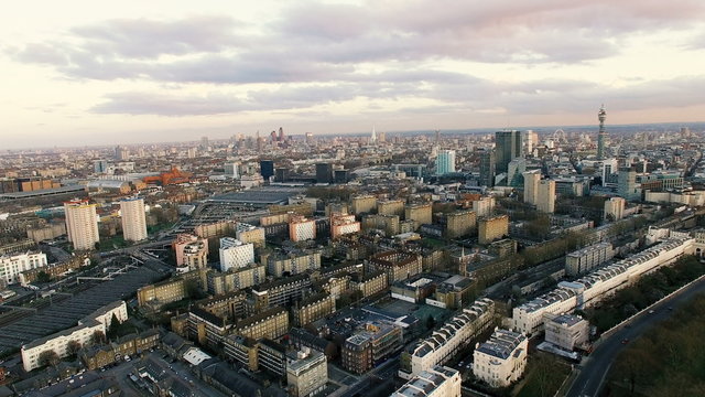 4K Ultra HD New Aerial View of Modern London City Town. Canary Wharf Business Finance Buildings, The Shard, London Eye, BT Tower, Centre Point in the Background